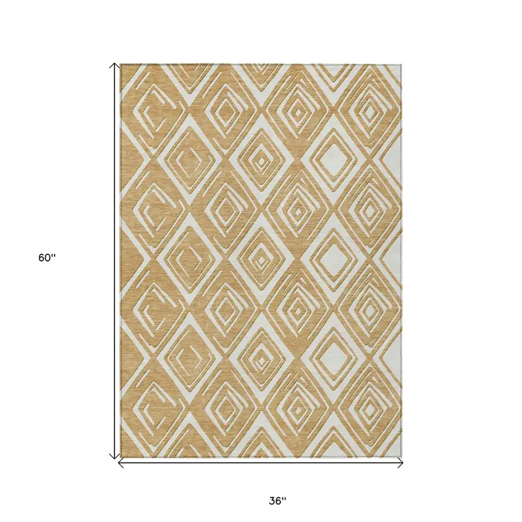 3' X 5' Gold And Ivory Geometric Washable Indoor Outdoor Area Rug
