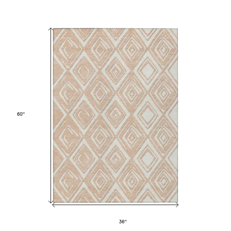 3' X 5' Peach And Ivory Geometric Washable Indoor Outdoor Area Rug