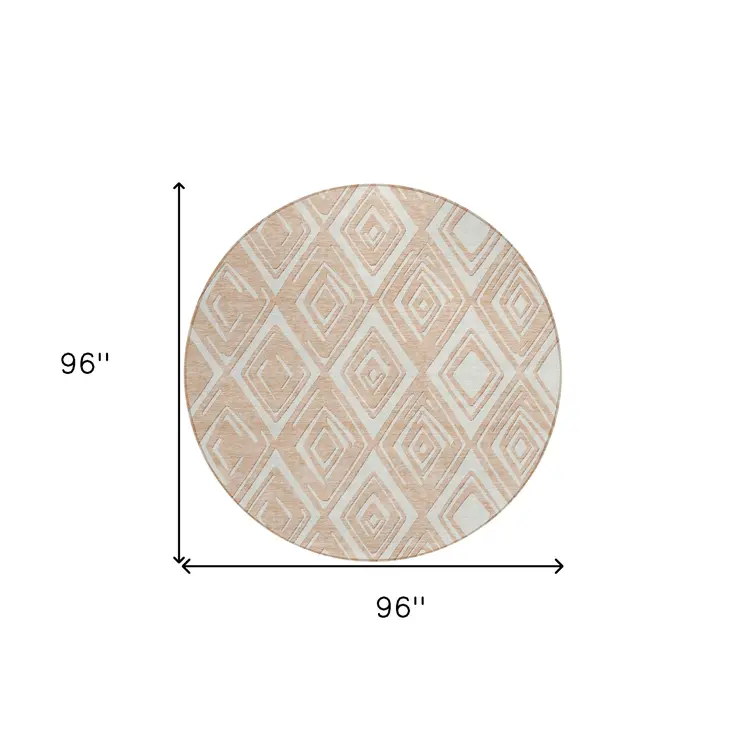8' Peach And Ivory Round Geometric Washable Indoor Outdoor Area Rug