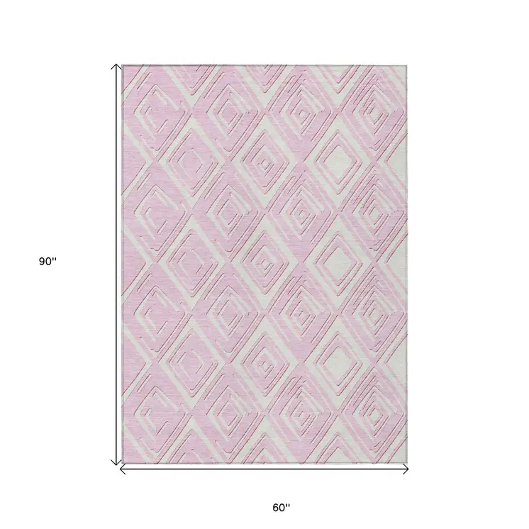 5' X 8' Pink And Ivory Geometric Washable Indoor Outdoor Area Rug