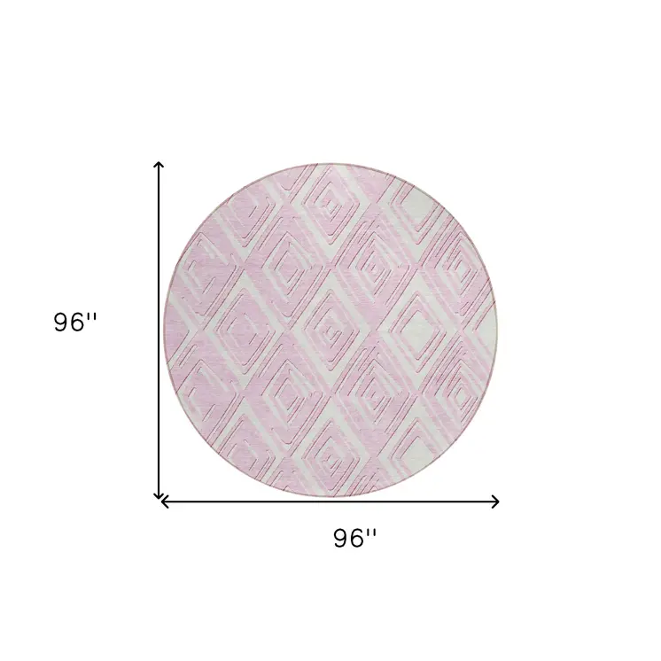 8' Pink And Ivory Round Geometric Washable Indoor Outdoor Area Rug