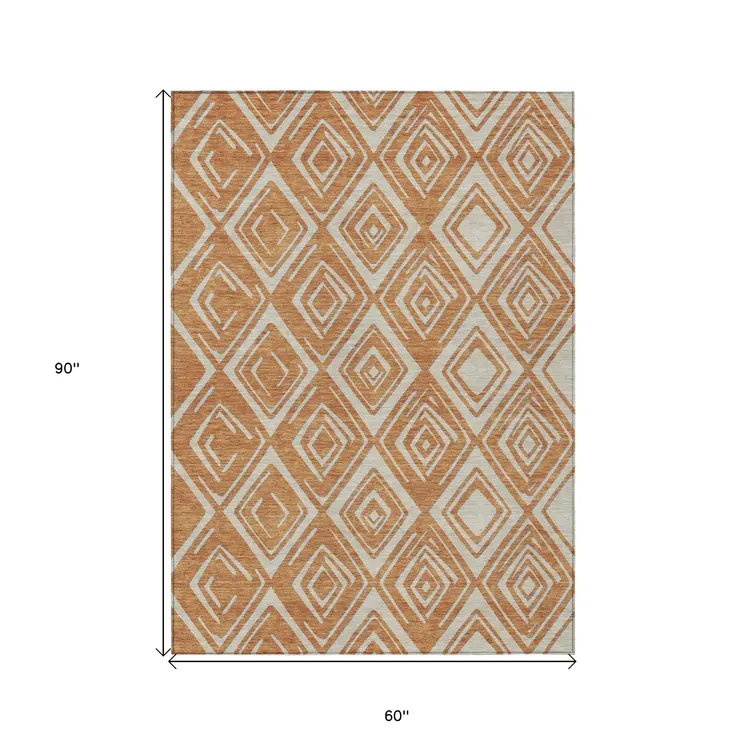5' X 8' Orange And Ivory Geometric Washable Indoor Outdoor Area Rug