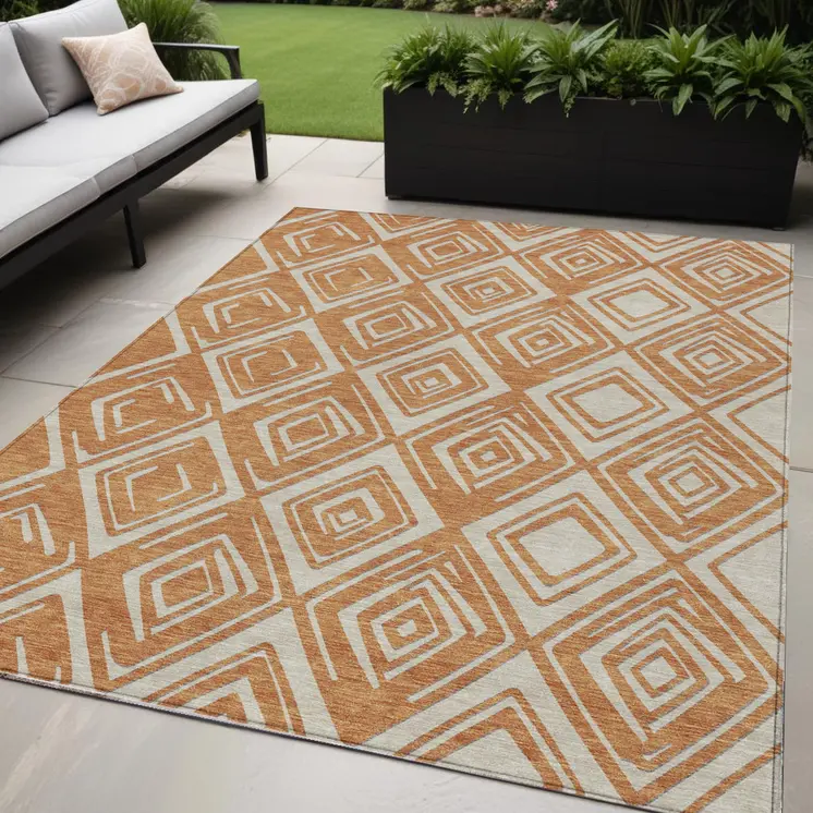 5' X 8' Orange And Ivory Geometric Washable Indoor Outdoor Area Rug