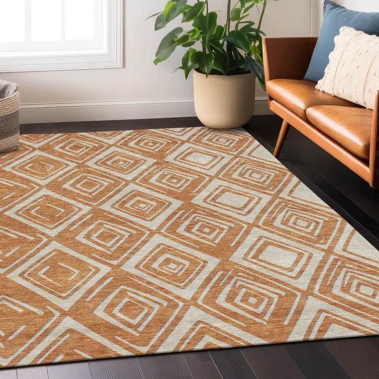 5' X 8' Orange And Ivory Geometric Washable Indoor Outdoor Area Rug