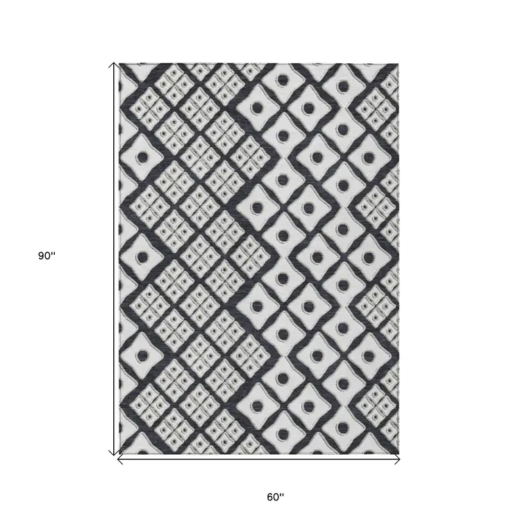 5' X 8' Black And Ivory Geometric Washable Indoor Outdoor Area Rug