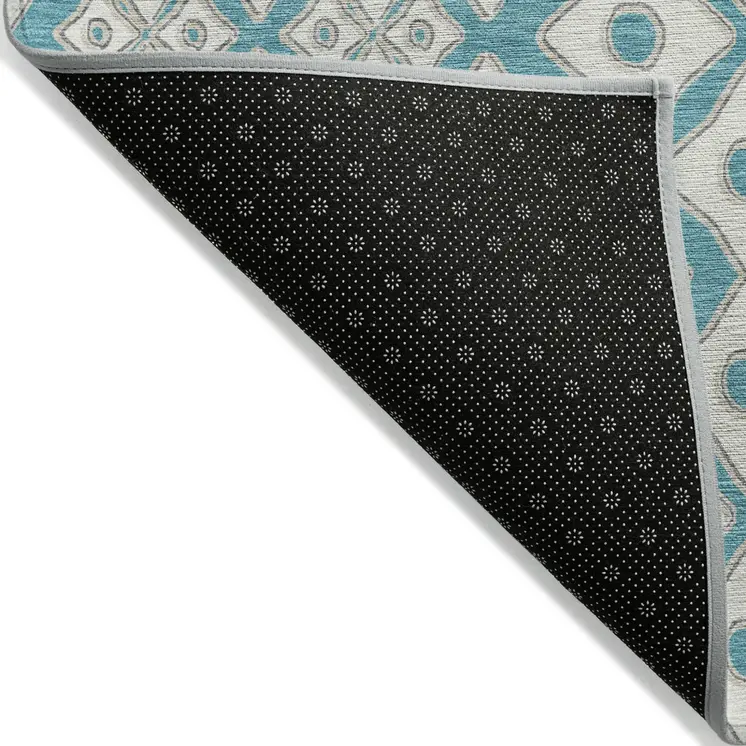 5' X 8' Teal Blue And Ivory Geometric Washable Indoor Outdoor Area Rug