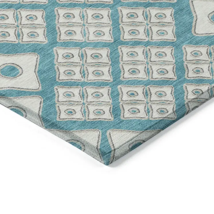 5' X 8' Teal Blue And Ivory Geometric Washable Indoor Outdoor Area Rug