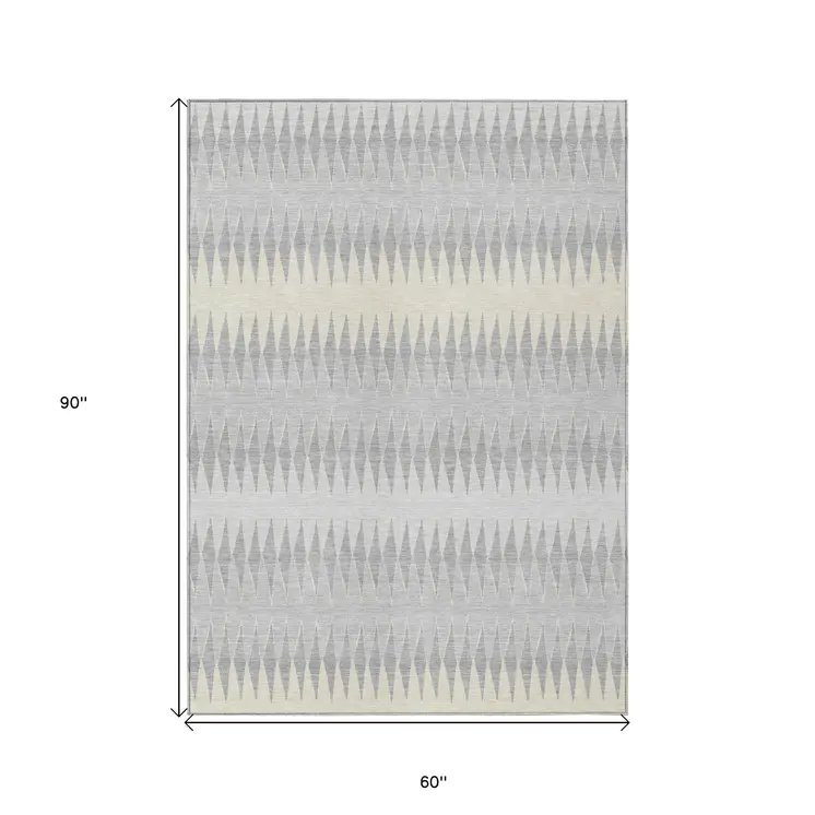 5' X 8' Silver Gray And Ivory Striped Washable Indoor Outdoor Area Rug