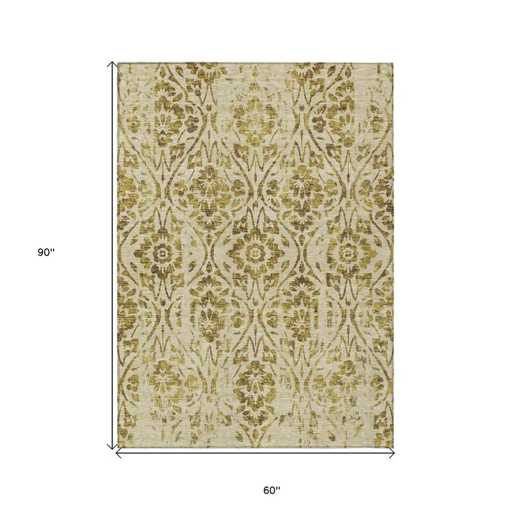 5' X 8' Gold And Brown Floral Washable Indoor Outdoor Area Rug