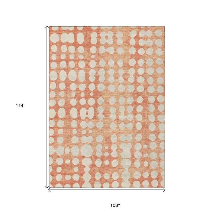 9' X 12' Coral And Ivory Abstract Washable Indoor Outdoor Area Rug