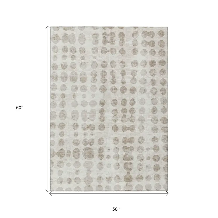 3' X 5' Ivory And Beige Abstract Washable Indoor Outdoor Area Rug
