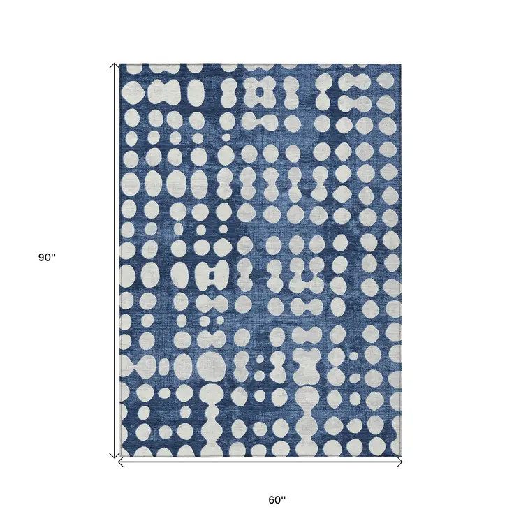 5' X 8' Navy Blue And Ivory Abstract Washable Indoor Outdoor Area Rug