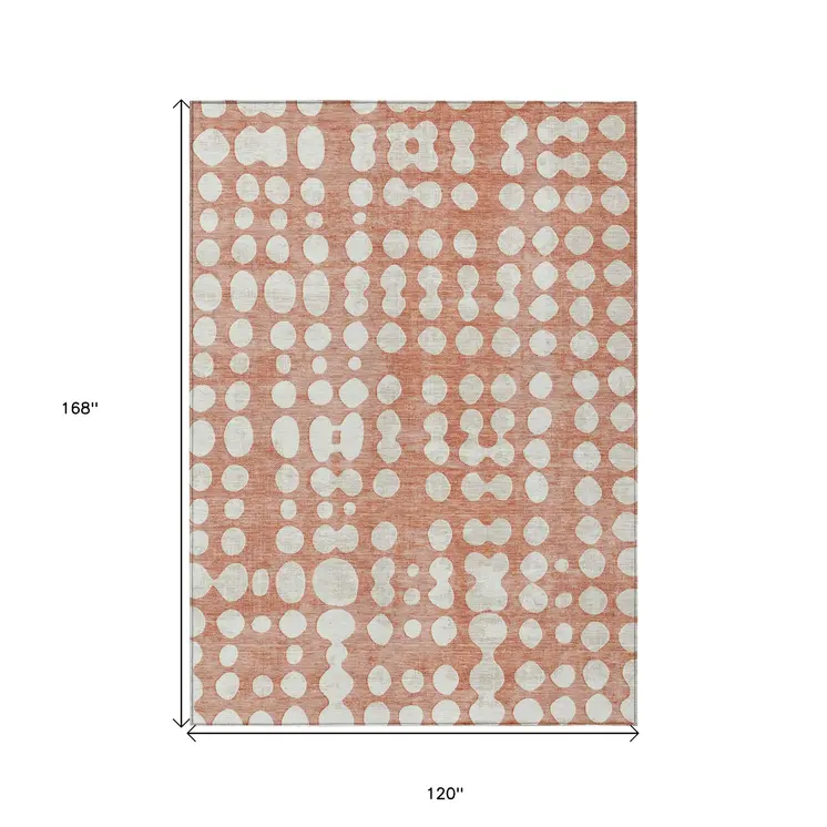 10' X 14' Salmon And Ivory Abstract Washable Indoor Outdoor Area Rug