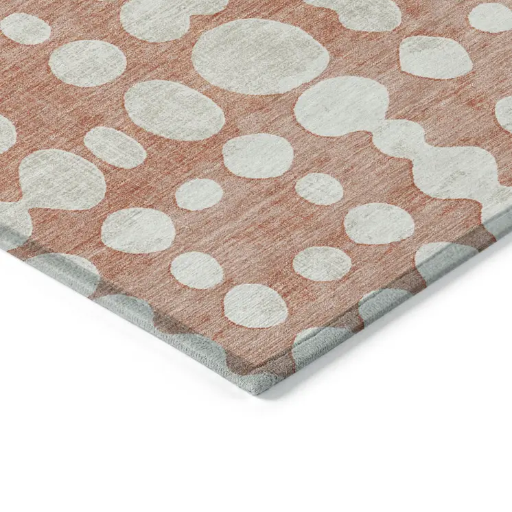 10' X 14' Salmon And Ivory Abstract Washable Indoor Outdoor Area Rug