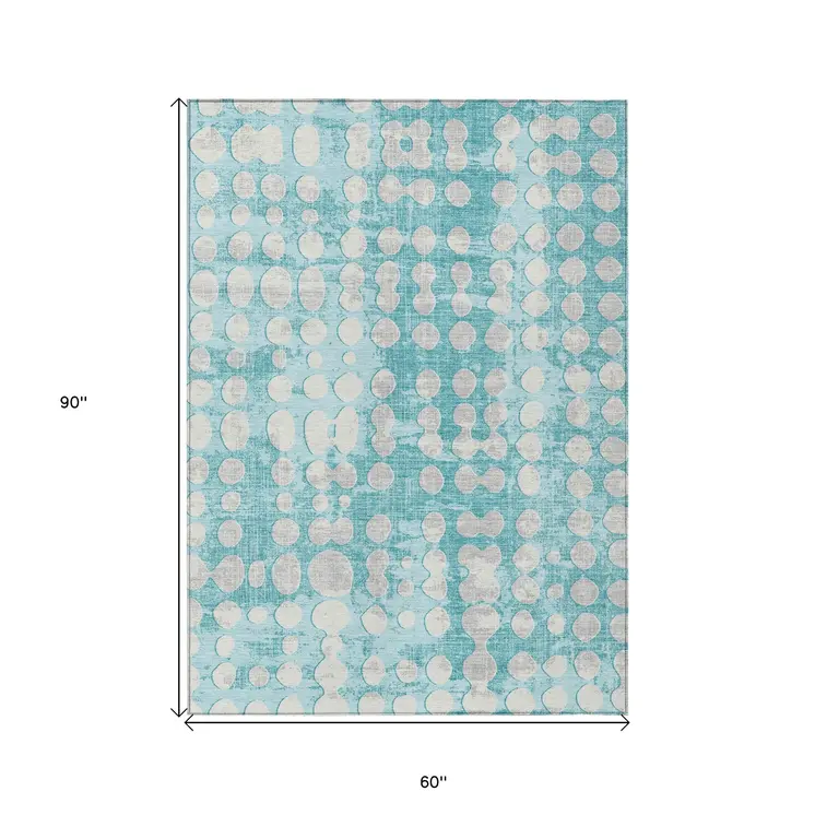5' X 8' Teal Blue And Ivory Abstract Washable Indoor Outdoor Area Rug