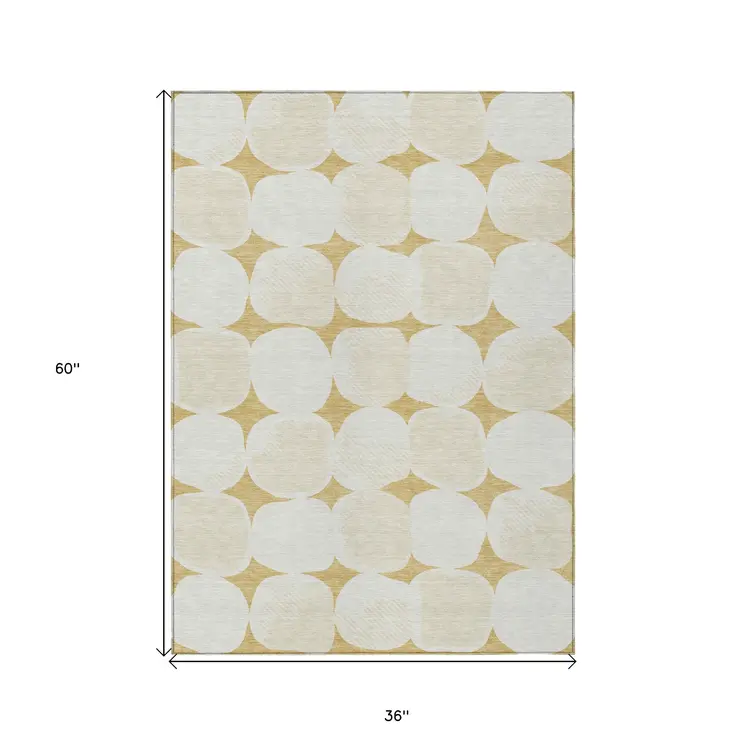 3' X 5' Gold And Beige Abstract Washable Indoor Outdoor Area Rug