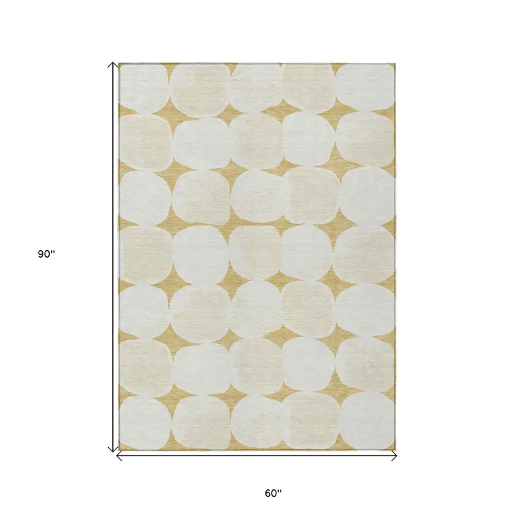 5' X 8' Gold And Beige Abstract Washable Indoor Outdoor Area Rug