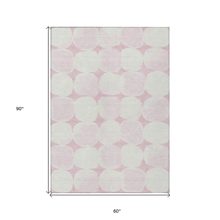 5' X 8' Pink And Ivory Abstract Washable Indoor Outdoor Area Rug