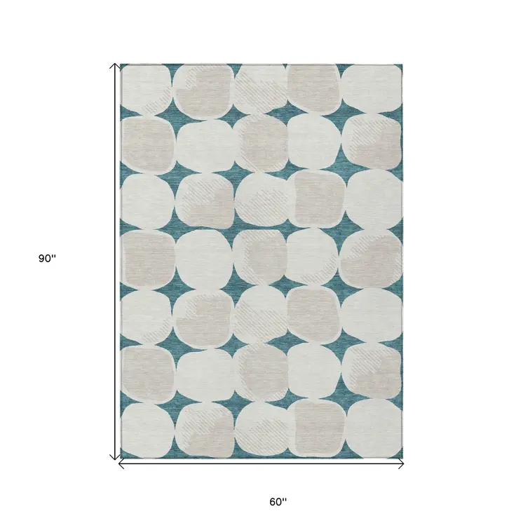 5' X 8' Teal Blue Beige And Ivory Abstract Washable Indoor Outdoor Area Rug