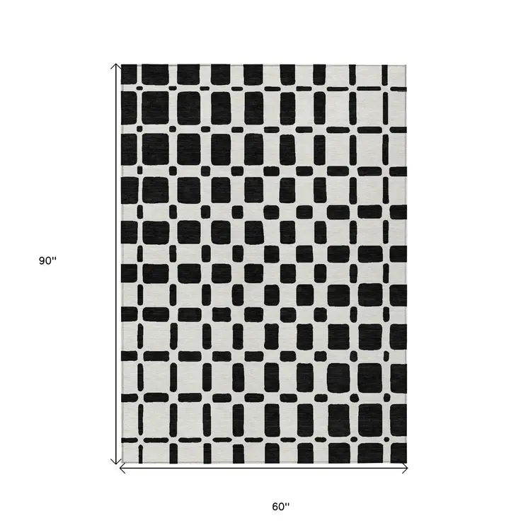 5' X 8' Black And Ivory Geometric Washable Indoor Outdoor Area Rug