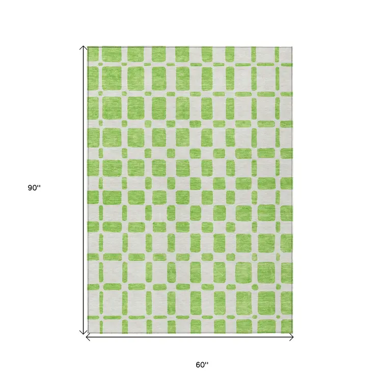 5' X 8' Lime Green And Ivory Geometric Washable Indoor Outdoor Area Rug