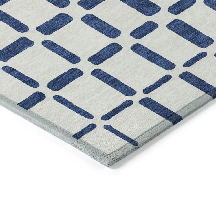 3' X 5' Navy Blue And Ivory Geometric Washable Indoor Outdoor Area Rug