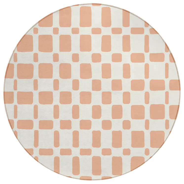 8' Peach And Beige Round Geometric Washable Indoor Outdoor Area Rug