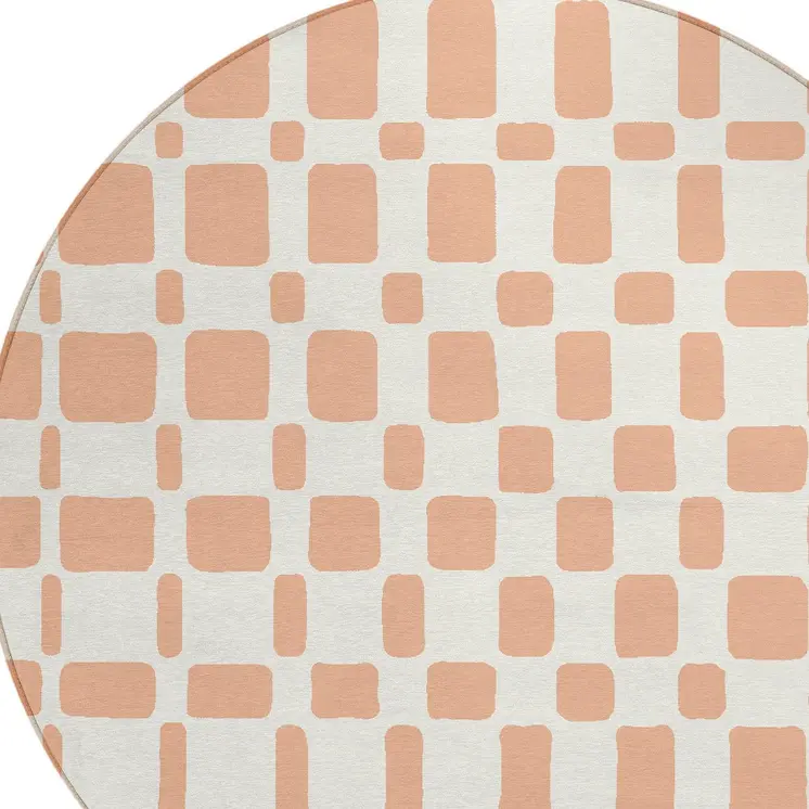 8' Peach And Beige Round Geometric Washable Indoor Outdoor Area Rug