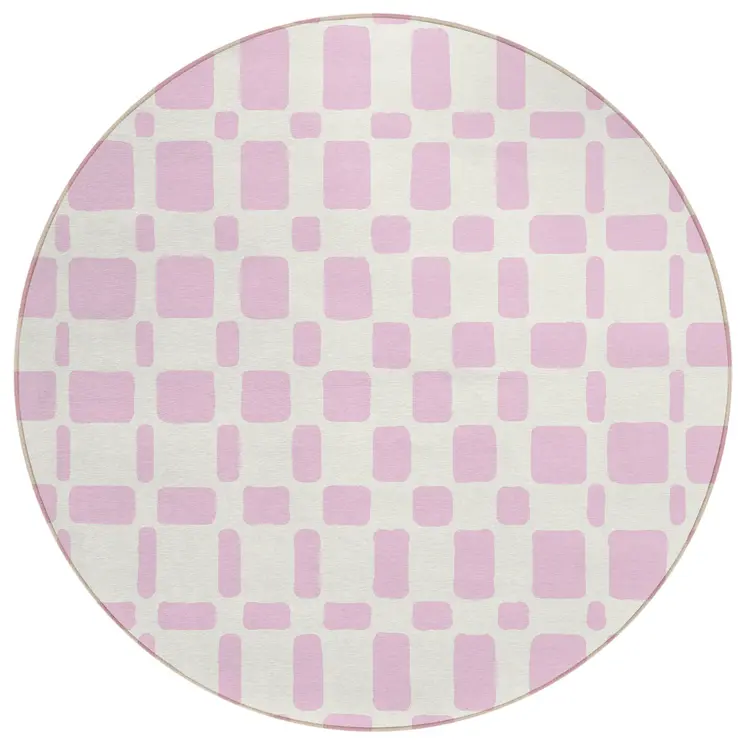 8' Pink And Ivory Round Geometric Washable Indoor Outdoor Area Rug