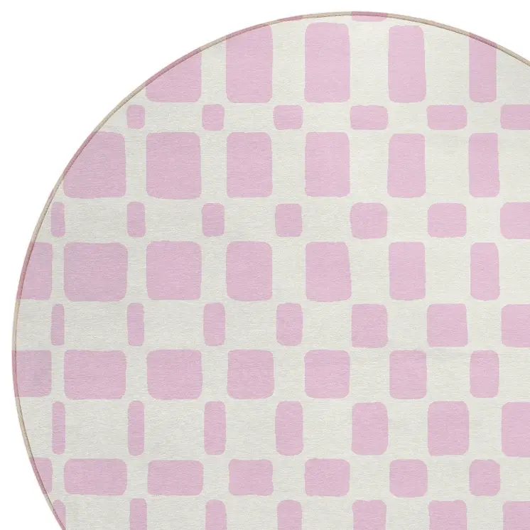 8' Pink And Ivory Round Geometric Washable Indoor Outdoor Area Rug