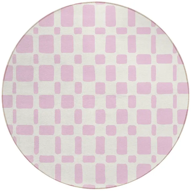 8' Pink And Ivory Round Geometric Washable Indoor Outdoor Area Rug