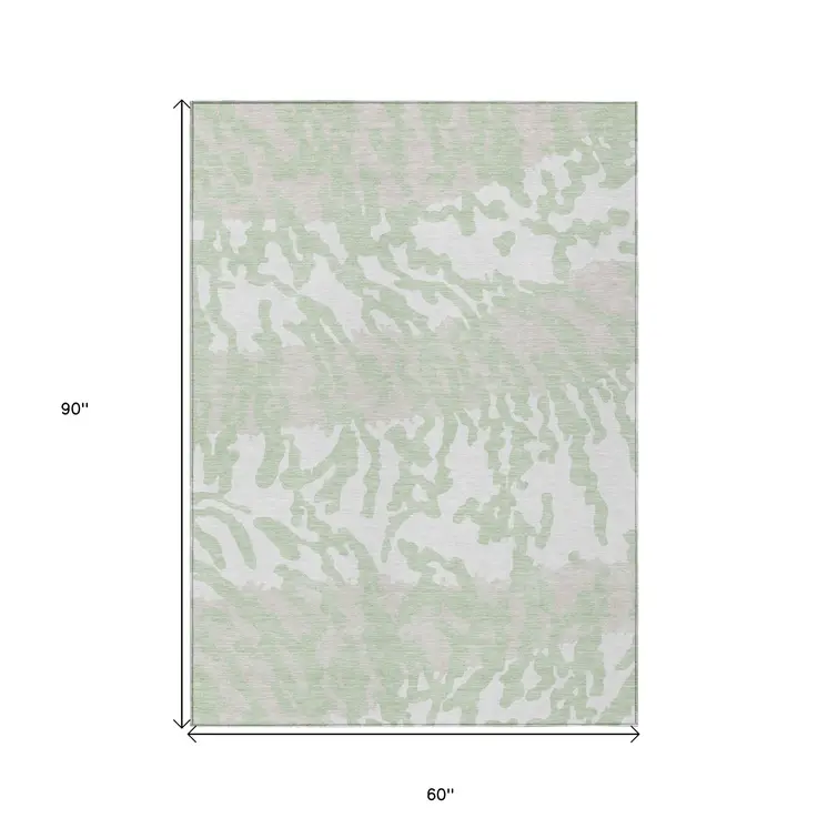 5' X 8' Artichoke Green Beige And Ivory Animal Print Washable Indoor Outdoor Area Rug