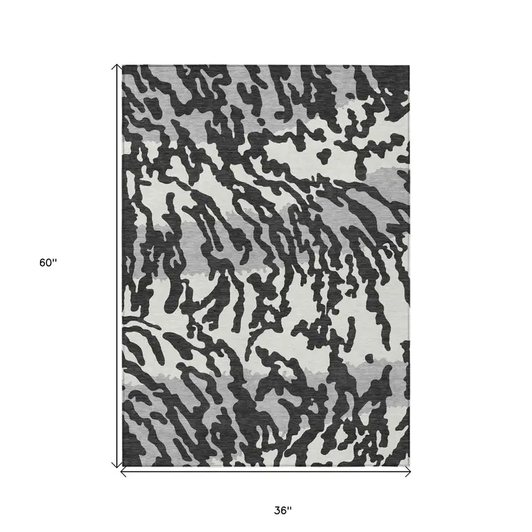 3' X 5' Black Gray And Ivory Animal Print Washable Indoor Outdoor Area Rug