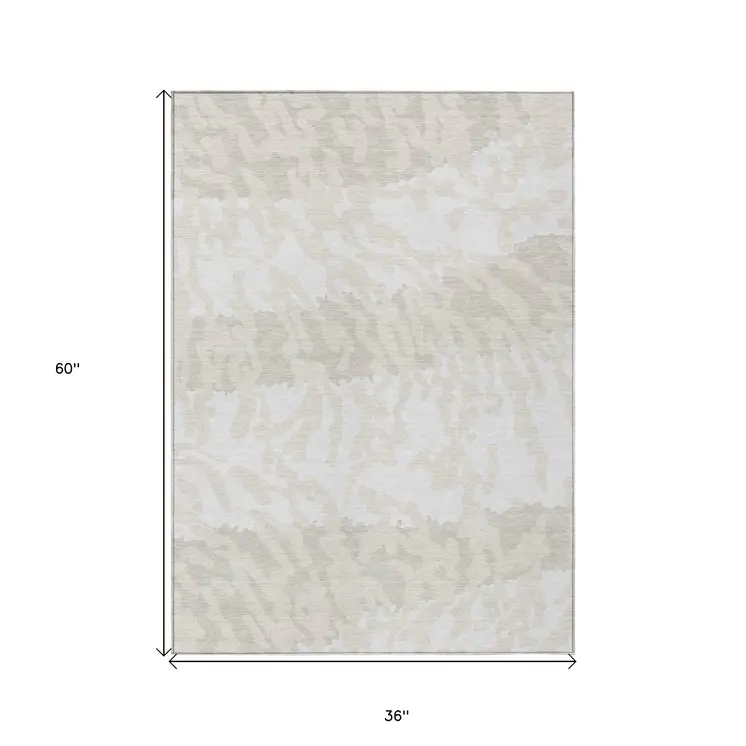 3' X 5' Ivory And Beige Animal Print Washable Indoor Outdoor Area Rug