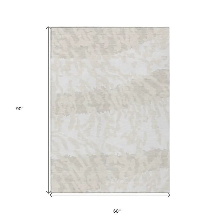 5' X 8' Ivory And Beige Animal Print Washable Indoor Outdoor Area Rug