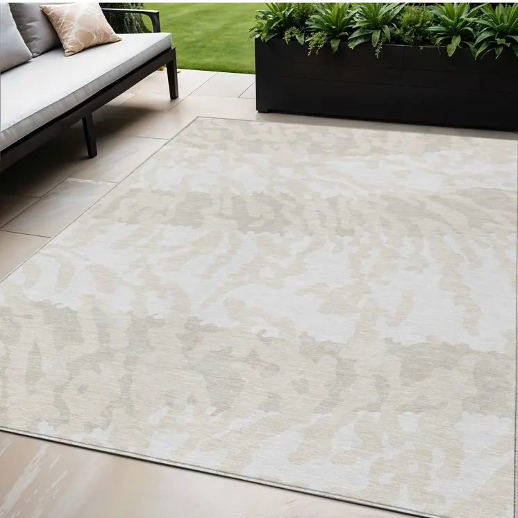 5' X 8' Ivory And Beige Animal Print Washable Indoor Outdoor Area Rug