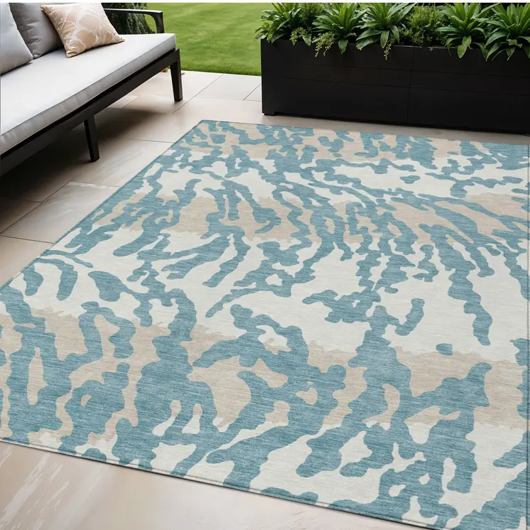 5' X 8' Teal Blue Beige And Ivory Animal Print Washable Indoor Outdoor Area Rug
