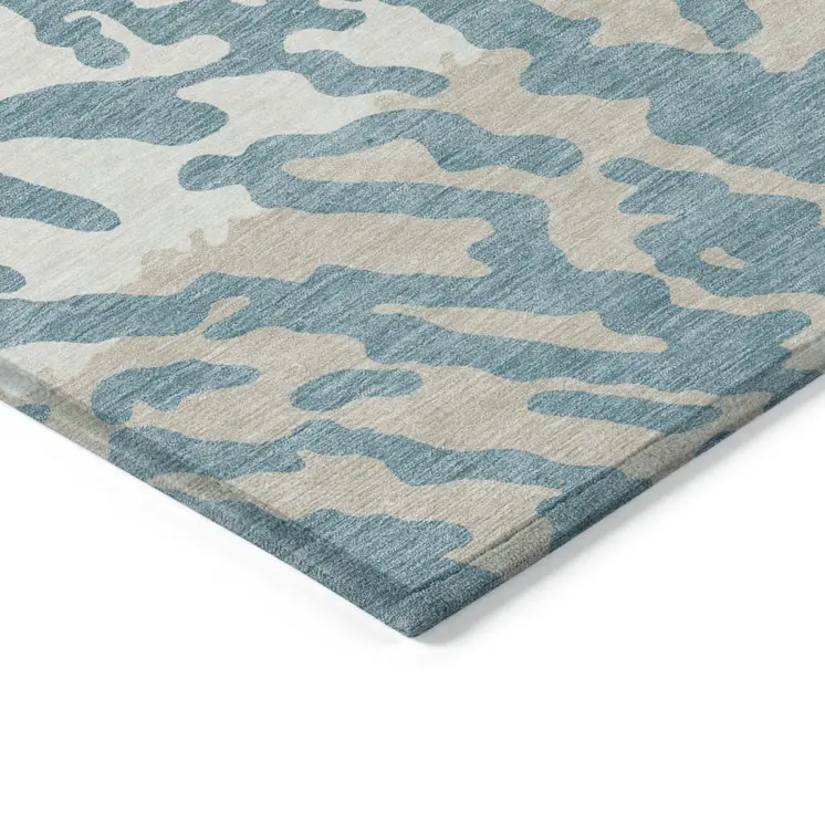 8' X 10' Teal Blue Beige And Ivory Animal Print Washable Indoor Outdoor Area Rug