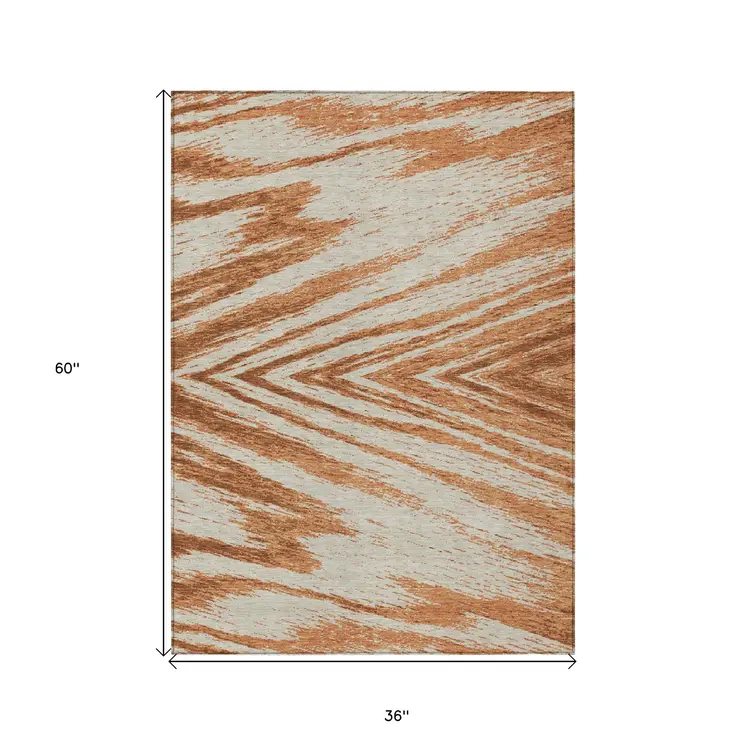 3' X 5' Orange Brown And Beige Abstract Washable Indoor Outdoor Area Rug