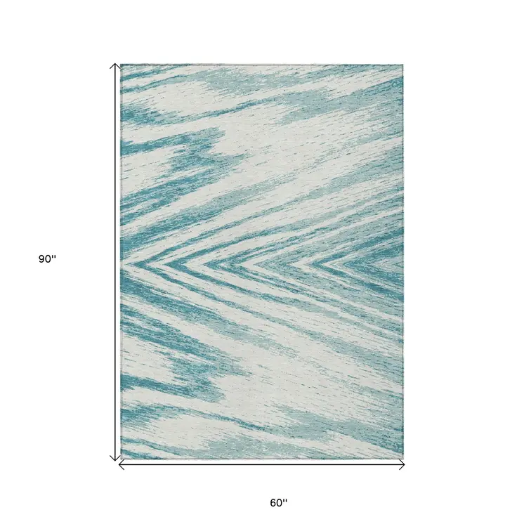 5' X 8' Teal Blue And Ivory Abstract Washable Indoor Outdoor Area Rug