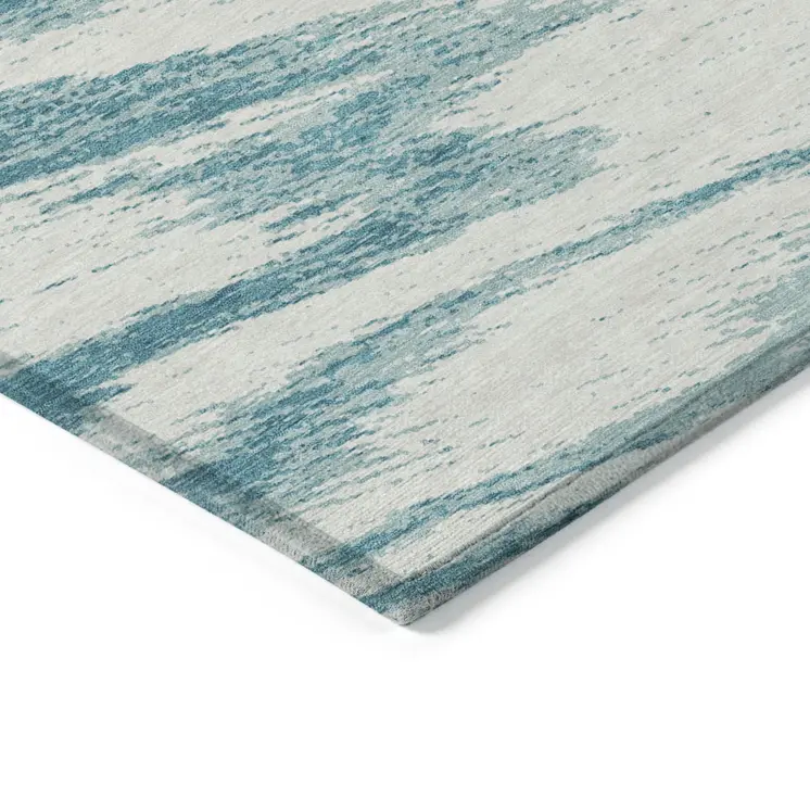 9' X 12' Teal Blue And Ivory Abstract Washable Indoor Outdoor Area Rug