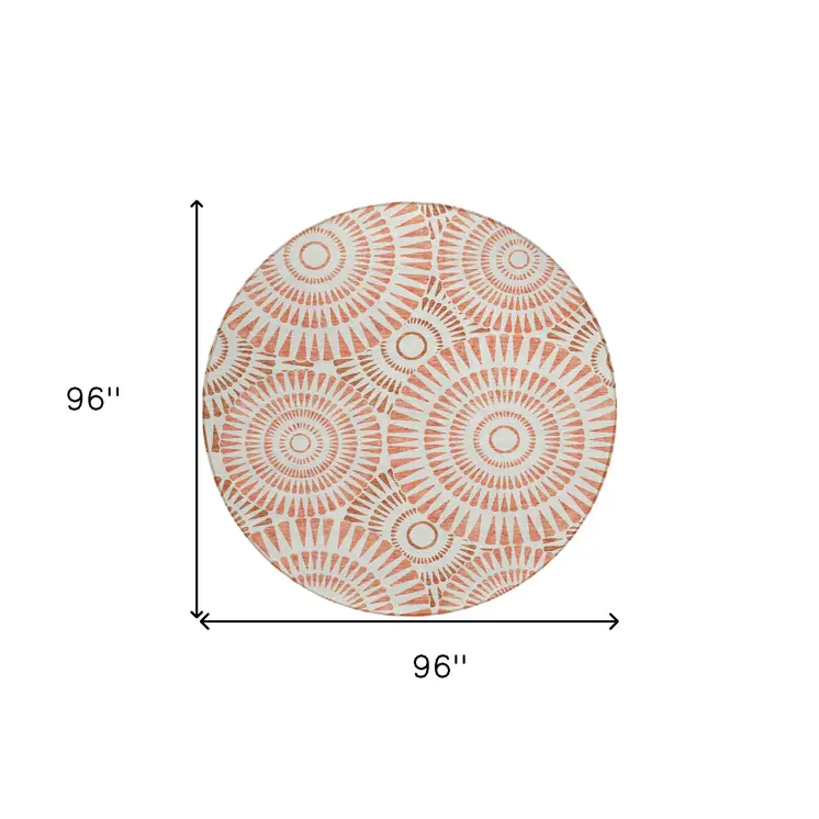 8' Coral And Ivory Round Geometric Washable Indoor Outdoor Area Rug