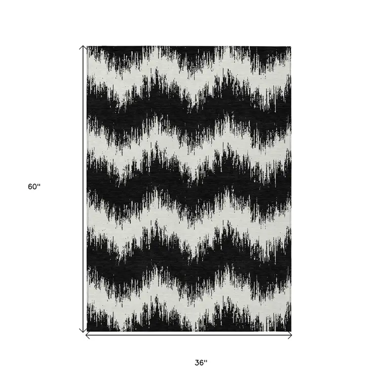 3' X 5' Black And Ivory Chevron Washable Indoor Outdoor Area Rug