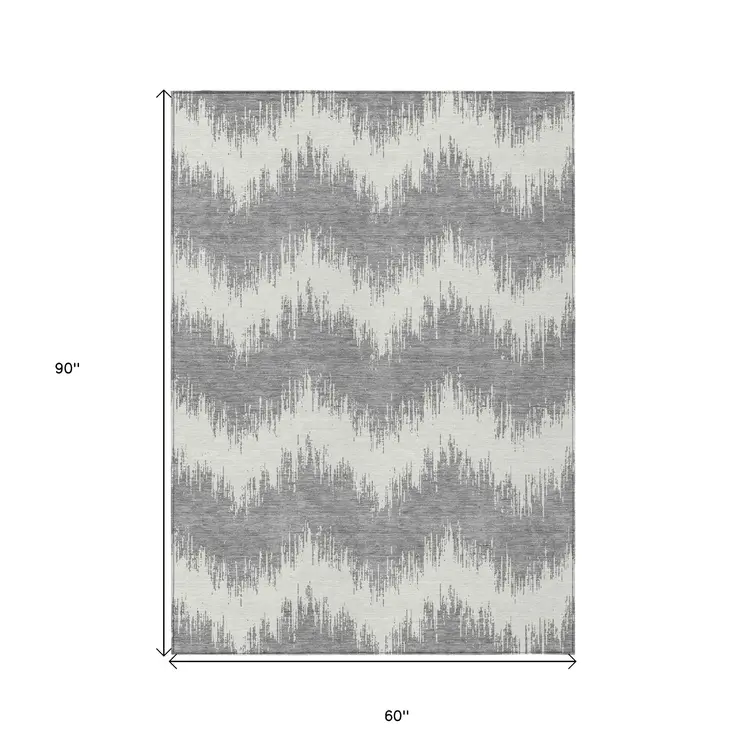 5' X 8' Gray And Ivory Chevron Washable Indoor Outdoor Area Rug