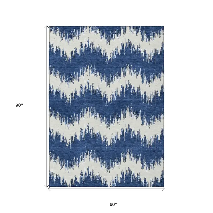 5' X 8' Navy Blue And Ivory Chevron Washable Indoor Outdoor Area Rug