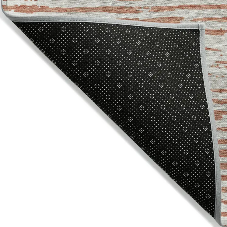 5' X 8' Coral And Ivory Striped Washable Indoor Outdoor Area Rug