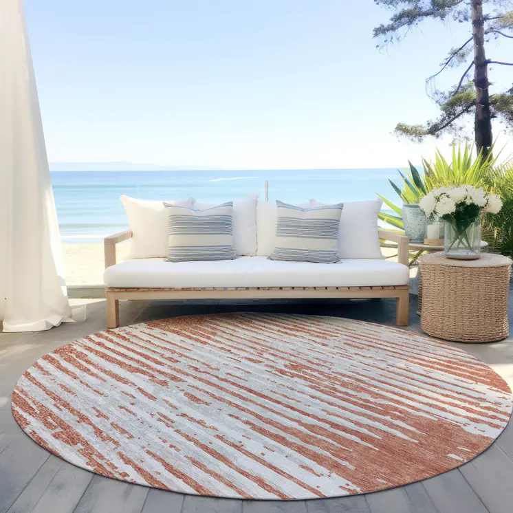 8' Coral And Ivory Round Striped Washable Indoor Outdoor Area Rug