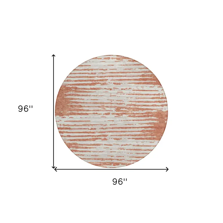 8' Coral And Ivory Round Striped Washable Indoor Outdoor Area Rug