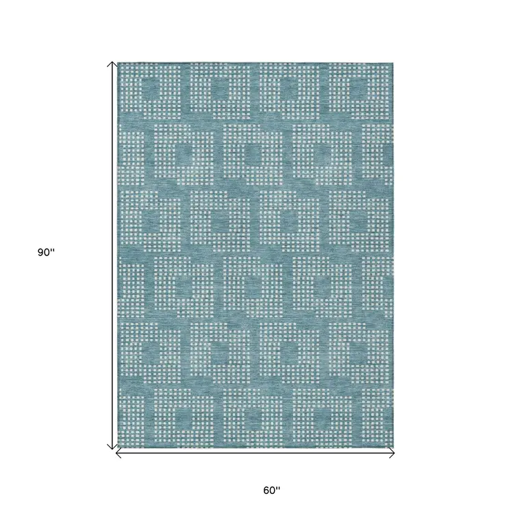 5' X 8' Teal Blue And Ivory Geometric Washable Indoor Outdoor Area Rug