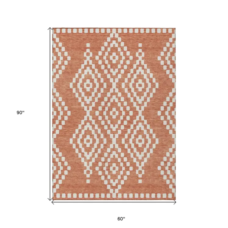 5' X 8' Salmon And Ivory Geometric Washable Indoor Outdoor Area Rug